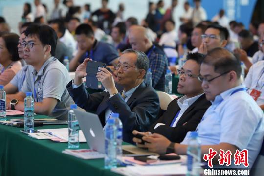 研討會現(xiàn)場圖?！■暮陚?攝