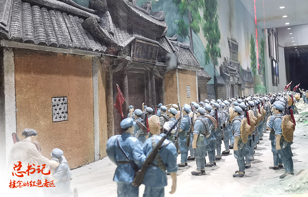 這是在福建省長(zhǎng)汀縣中復(fù)村拍攝的紅軍長(zhǎng)征出發(fā)動(dòng)員會(huì)微型雕塑（2021年4月27日攝）。